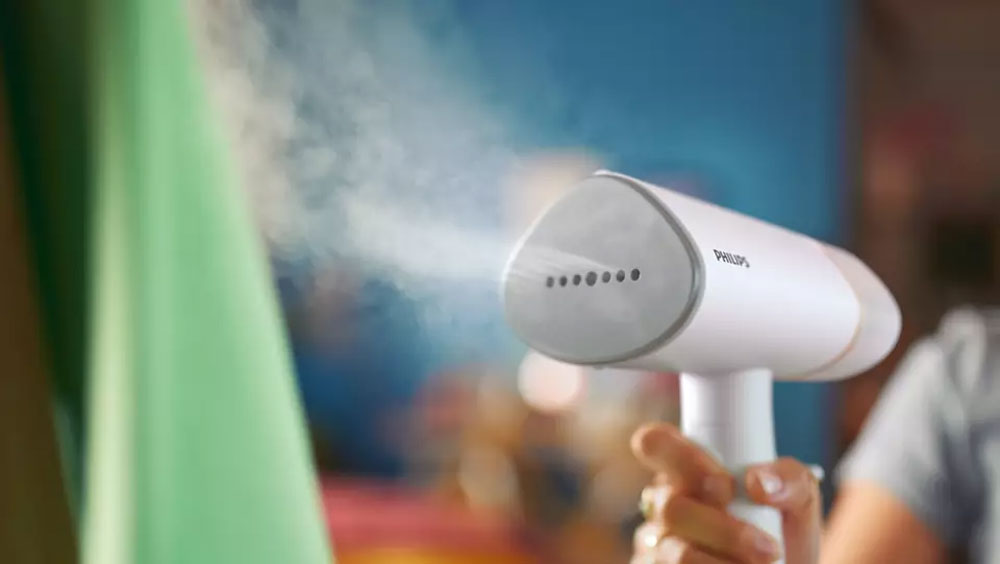 Bàn ủi hơi nước cầm tay Philips STH3020/10 - Hàng chính hãng